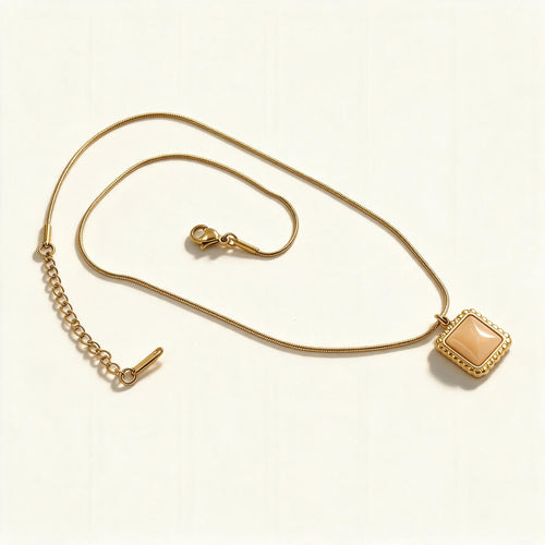Gold-tone snake chain necklace with champagne square cabochon pendant