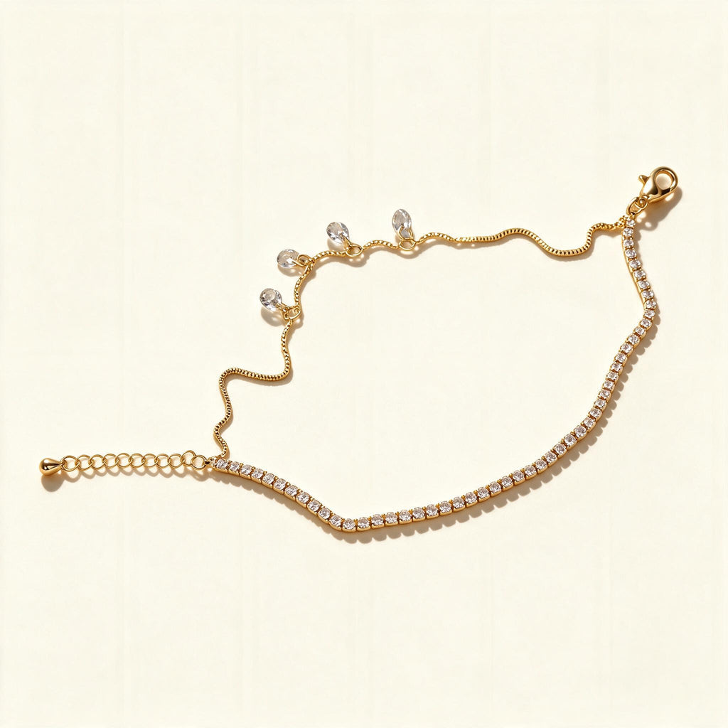Gold-tone cubic zirconia tennis chain necklace with hanging crystal drops