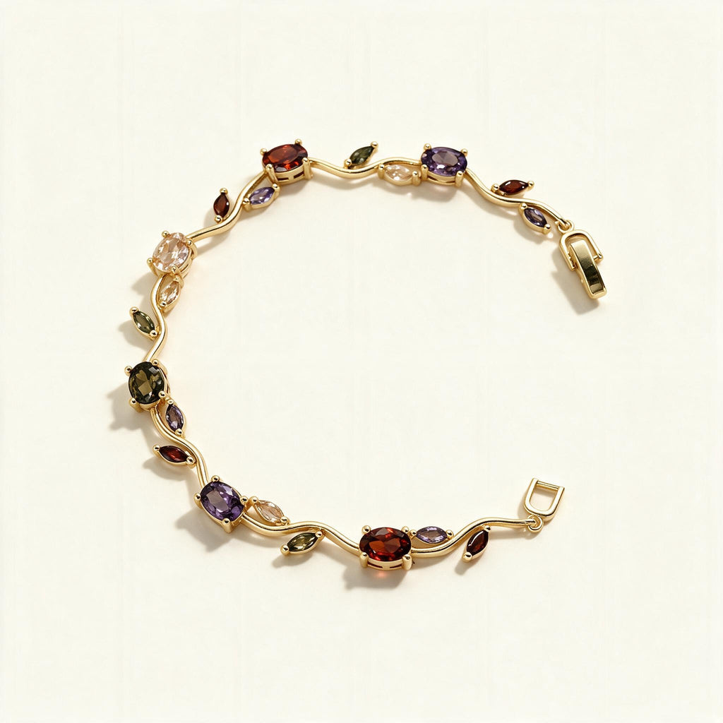 Gold-tone tennis bracelet with red, purple, olive and champagne oval stones