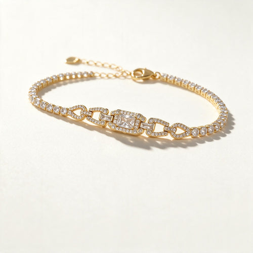 Gold-tone cubic zirconia tennis bracelet with art deco centre panel