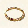 Gold-tone tennis bracelet with multicoloured baguette-cut stones