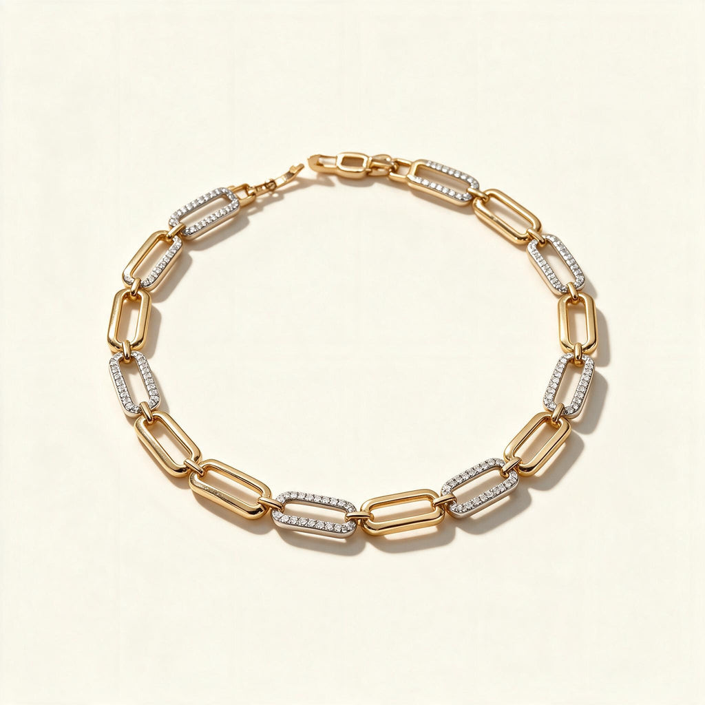 Gold-tone paperclip link bracelet with alternating pavé crystal links