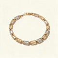 Gold-tone paperclip link bracelet with alternating pavé crystal links