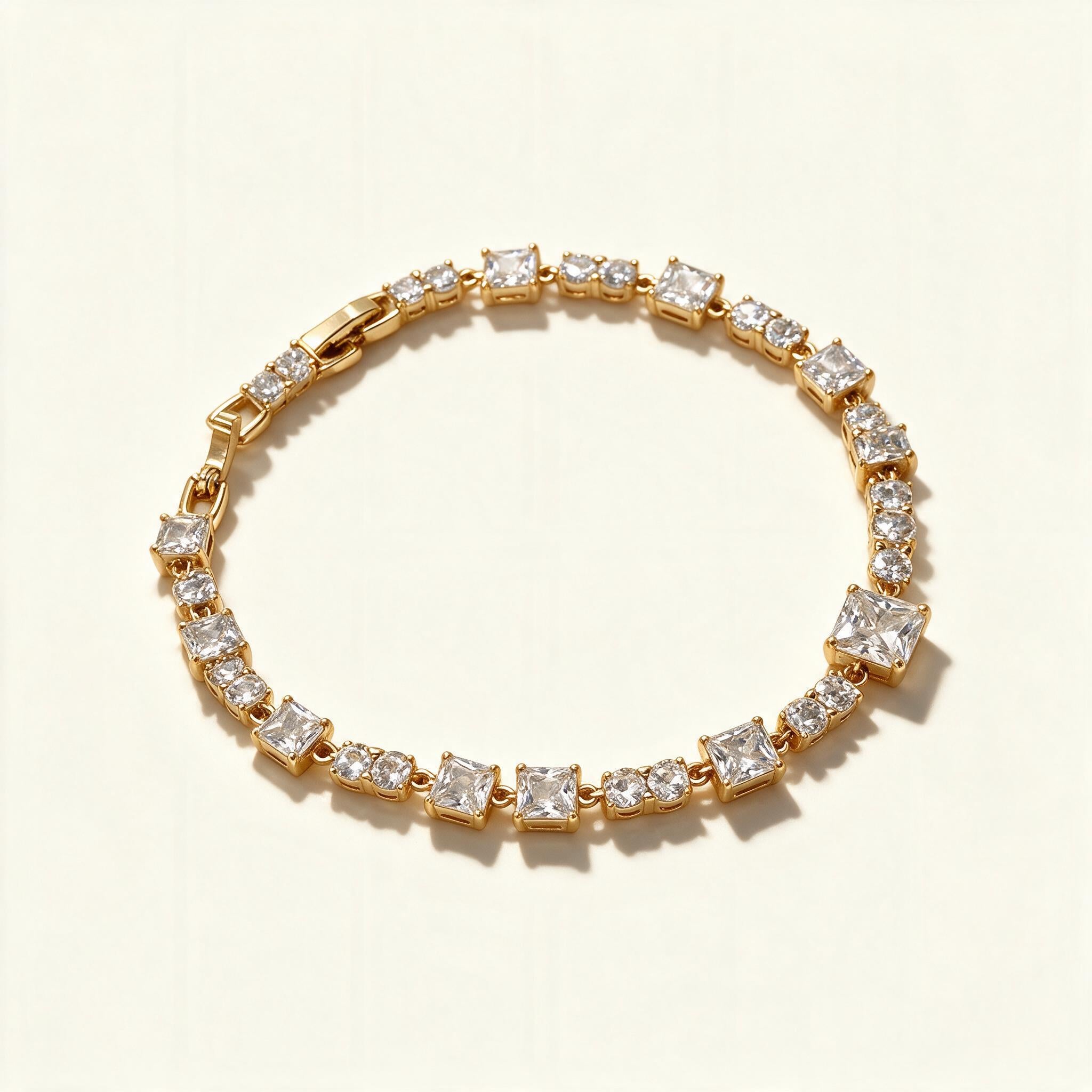 Gold-tone tennis bracelet with alternating princess-cut and round cubic zirconia
