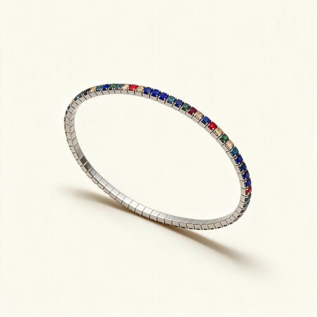 Silver-tone thin stretch tennis bracelet set with blue, red, green and champagne crystals