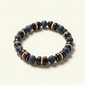 Beaded stretch bracelet with dark wood beads and grey veined stone beads