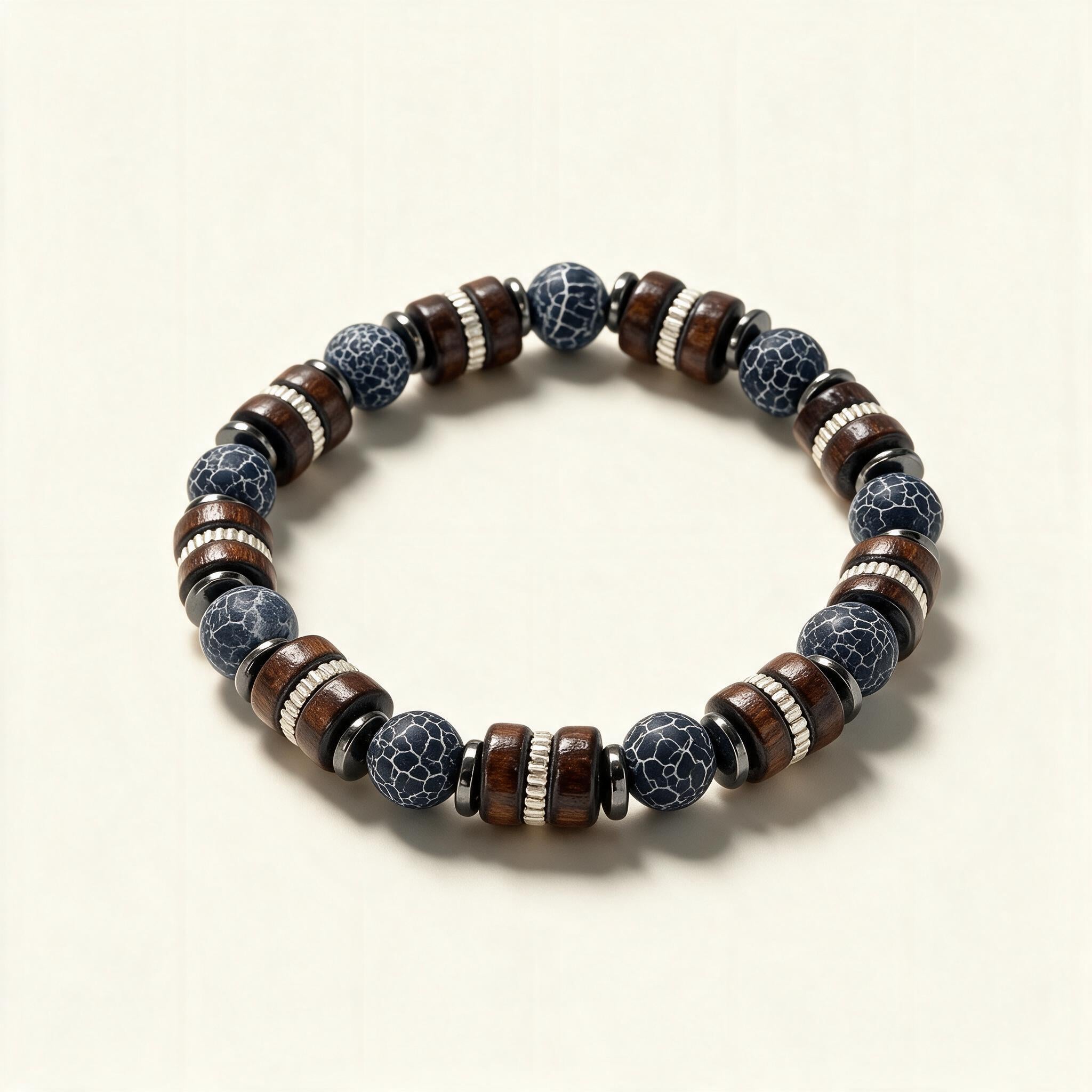 Beaded stretch bracelet with dark wood beads and grey veined stone beads
