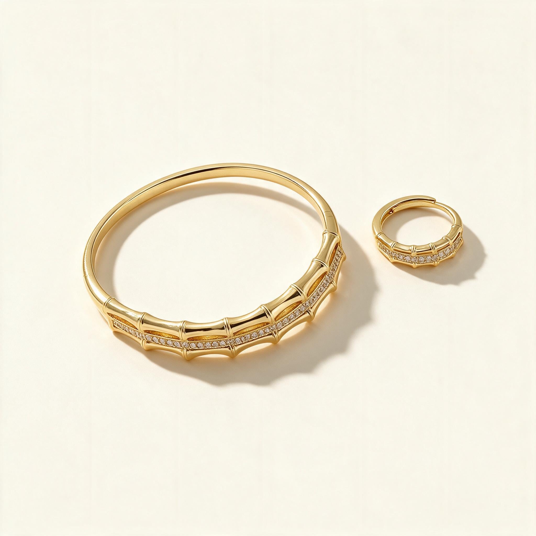 Gold-tone bamboo segment bangle with matching pavé cubic zirconia ring