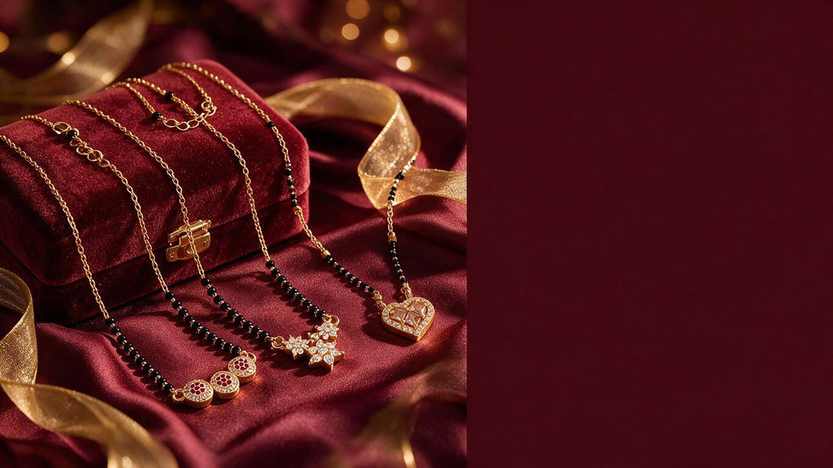 Black bead mangalsutra chains with ruby, star and heart pendants on wine velvet with a gold ribbon