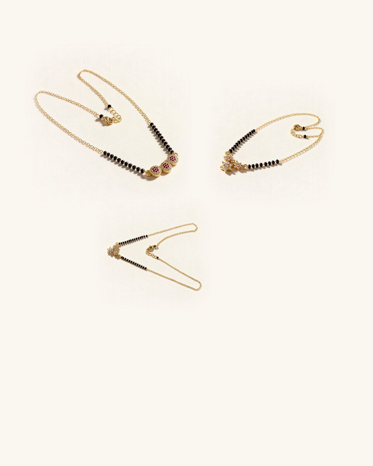 Hands wearing gold bangles
